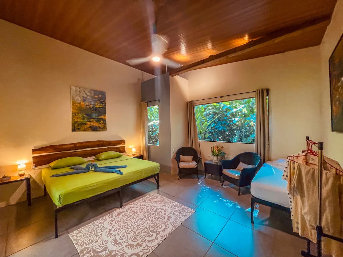 Black machined steel pen with hexagonal grip and small white logo at top.