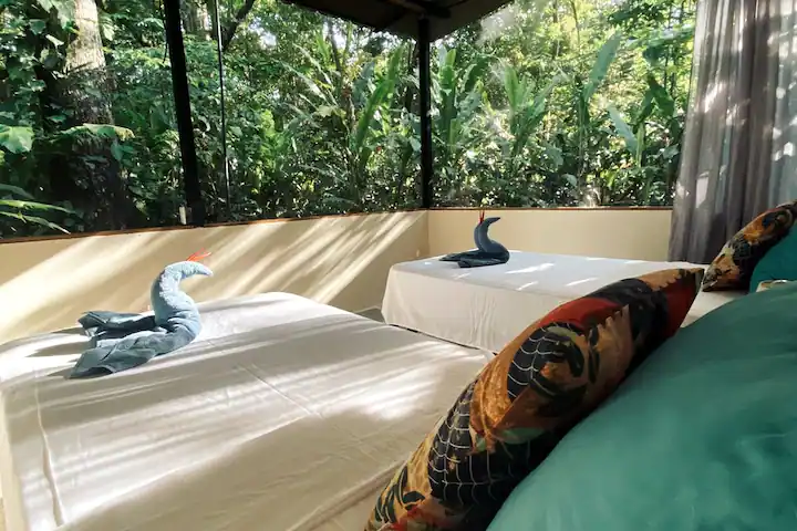 Black machined steel pen with hexagonal grip and small white logo at top.